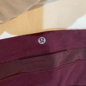 Red lulu lemon leggings with see through slit in back (size 4)